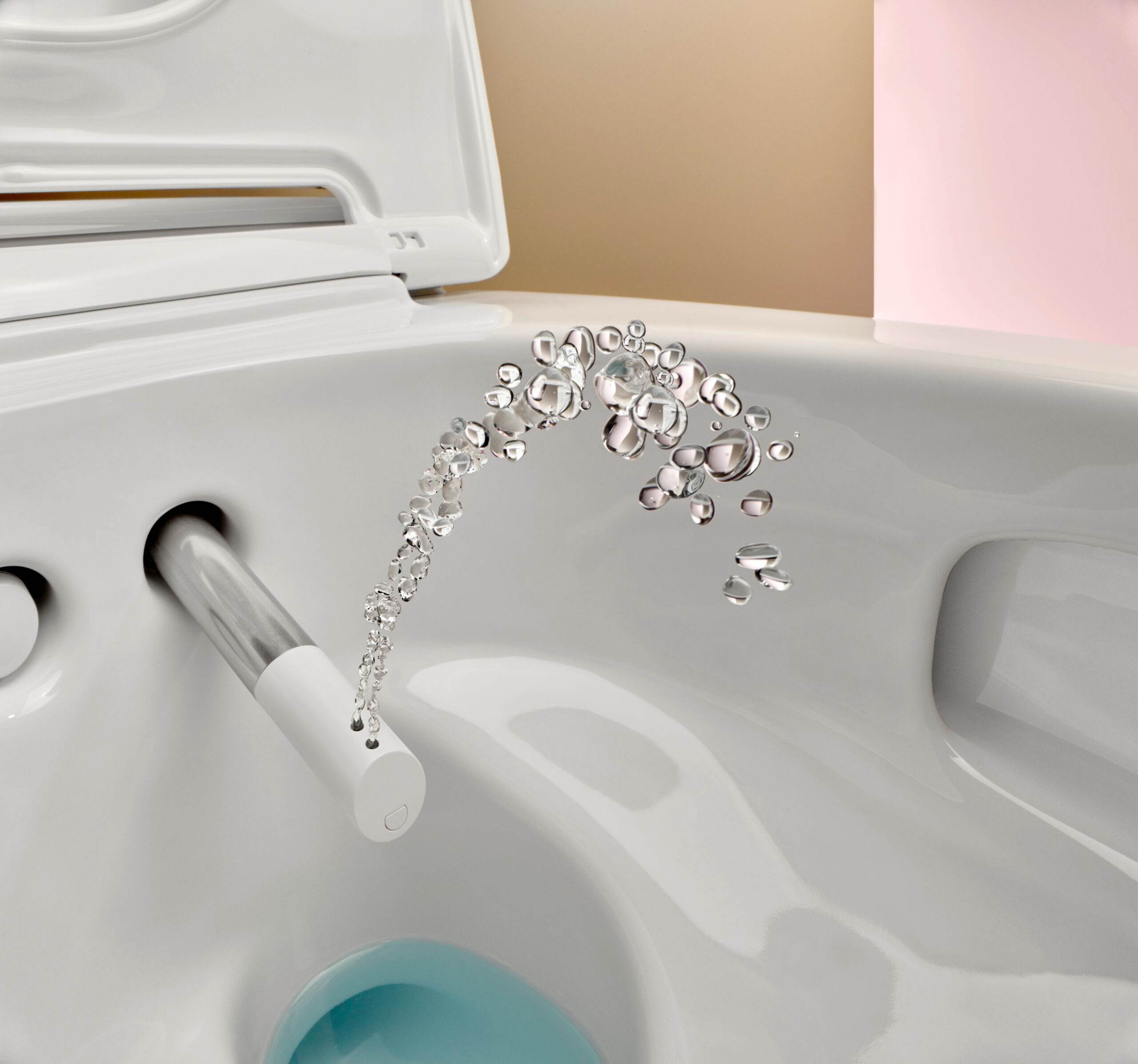 Geberit AquaClean Mera shower toilet spraying water from its extended nozzle